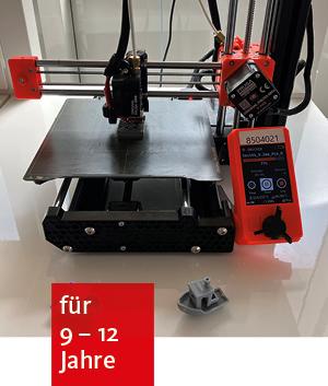 ein technisches Gerät steht auf einen Tisch. Es ist ein kleiner 3 D Drucker
